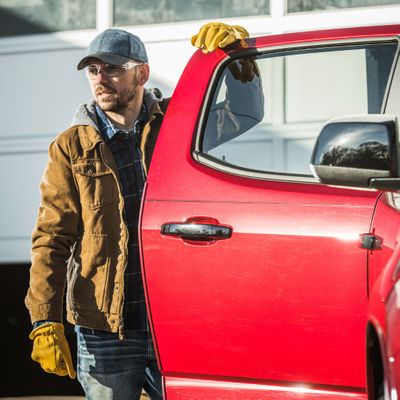 man opening truck door