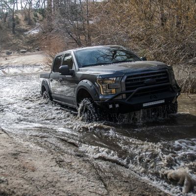 truck driving through water