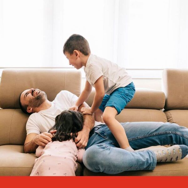 family playing on couch