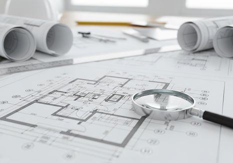 Architectural Blueprint with Magnifying Glass