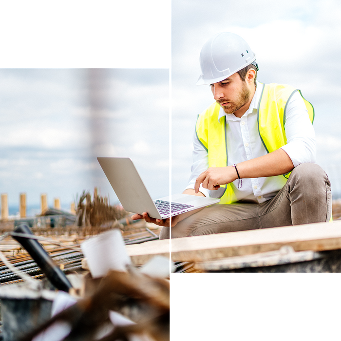 construction worker using laptop