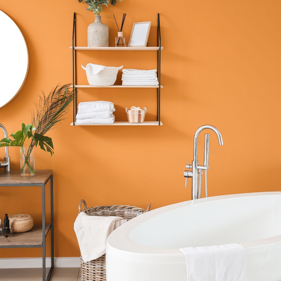 Orange Bathroom with Floating Shelves