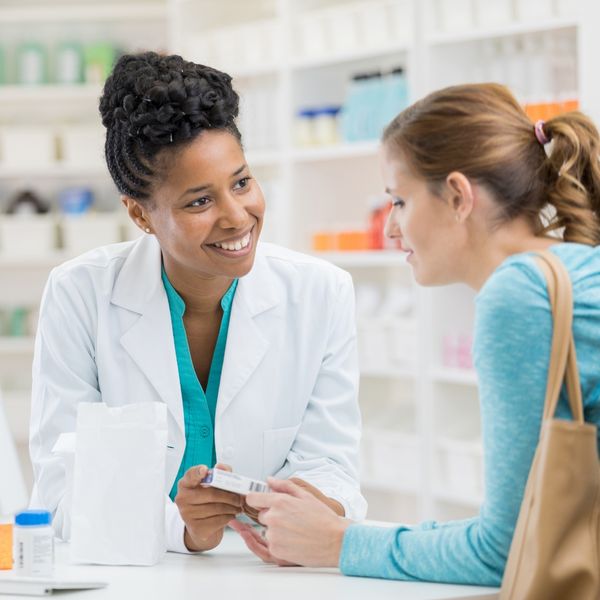 pharmacist talking with a customer