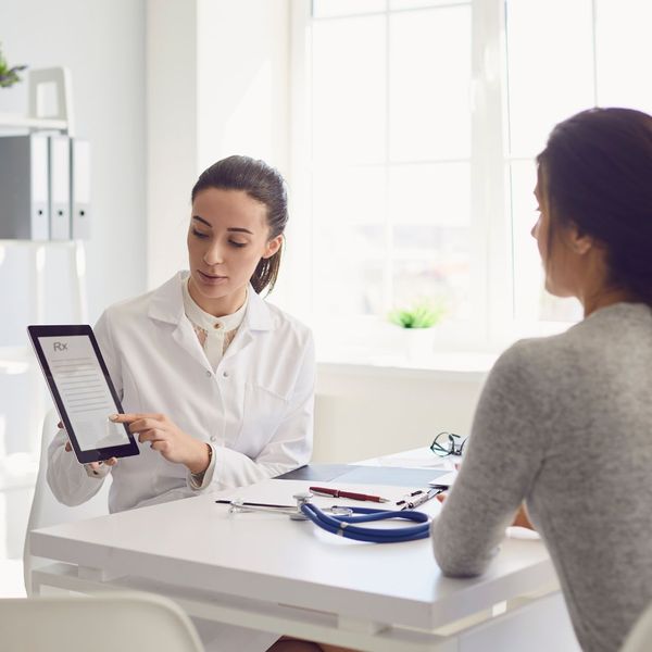 pharmacist talking to client