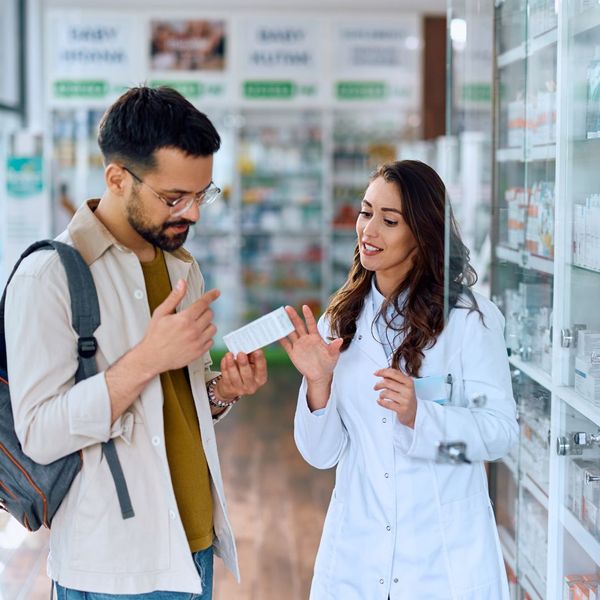 pharmacist talking to patient