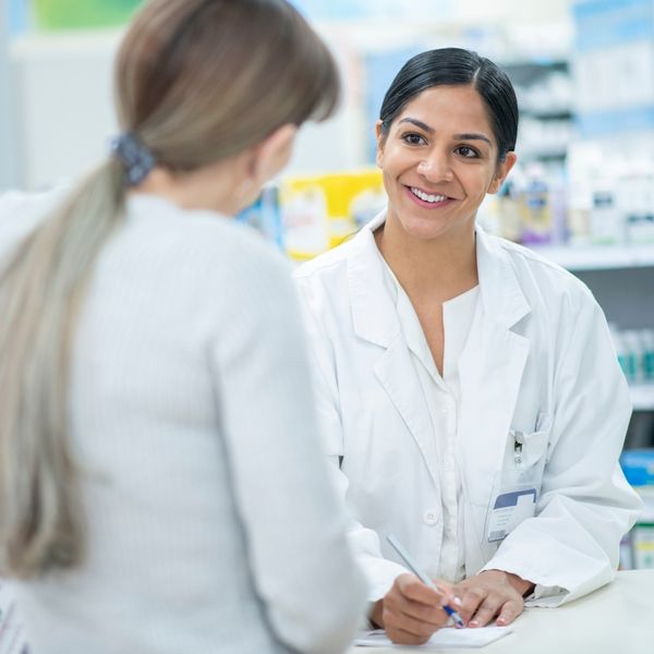 pharmacist talking with a customer
