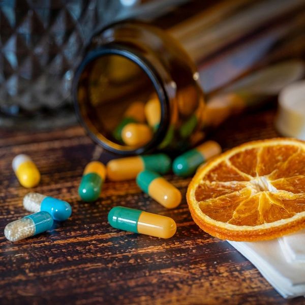 vitamins and orange slice