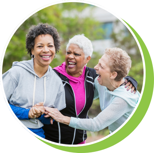 older women laughing in the park