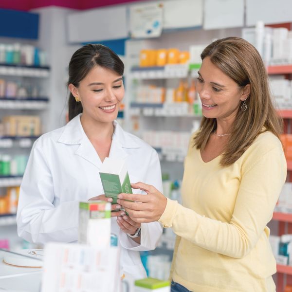 pharmacist talking with a customer
