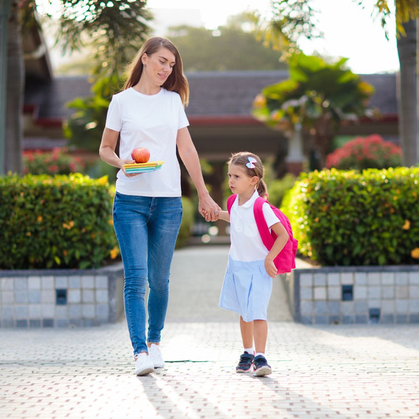 daughter holding moms hand