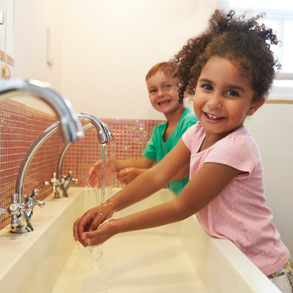 children washing their hands. 