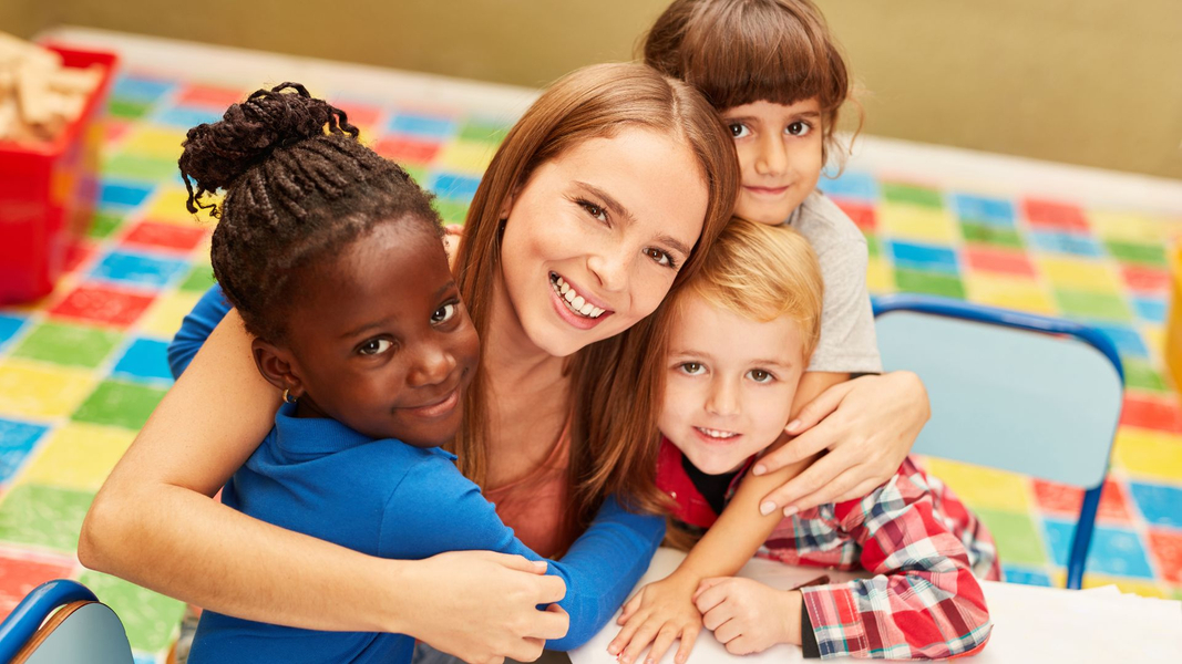 daycare teacher with students