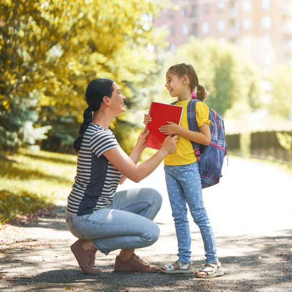 mother smiling with daughter