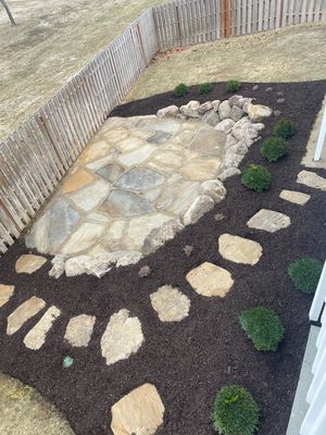 Flagstone Patio w_ Boulder wall & Steppers - Leibman.jpg