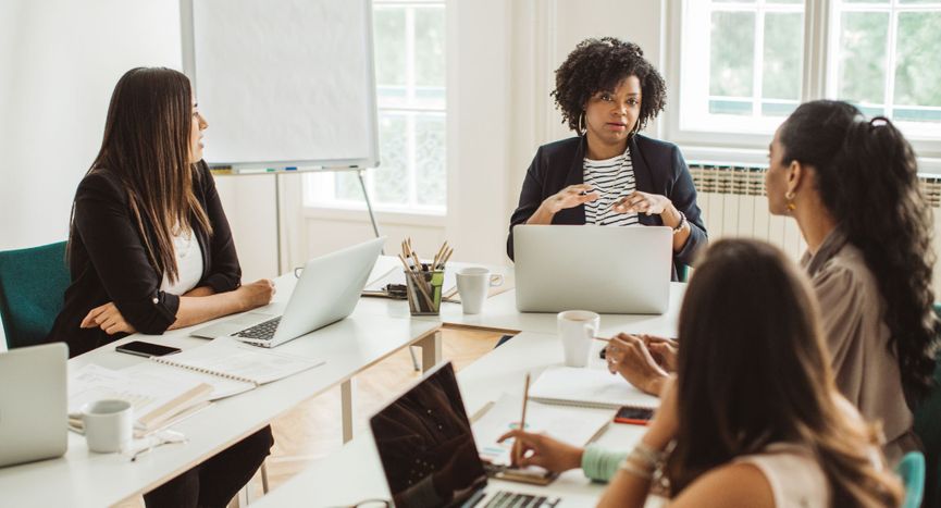 Women talking in a meeting