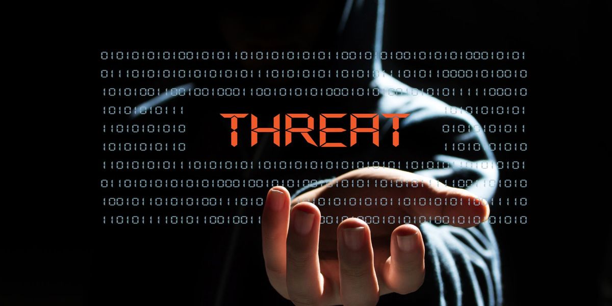 man holding code that says THREAT