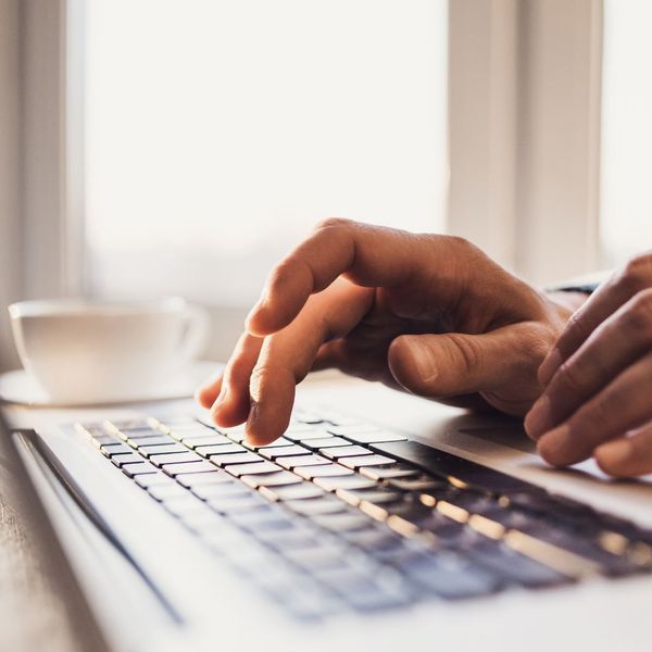 closeup of typing on a computer