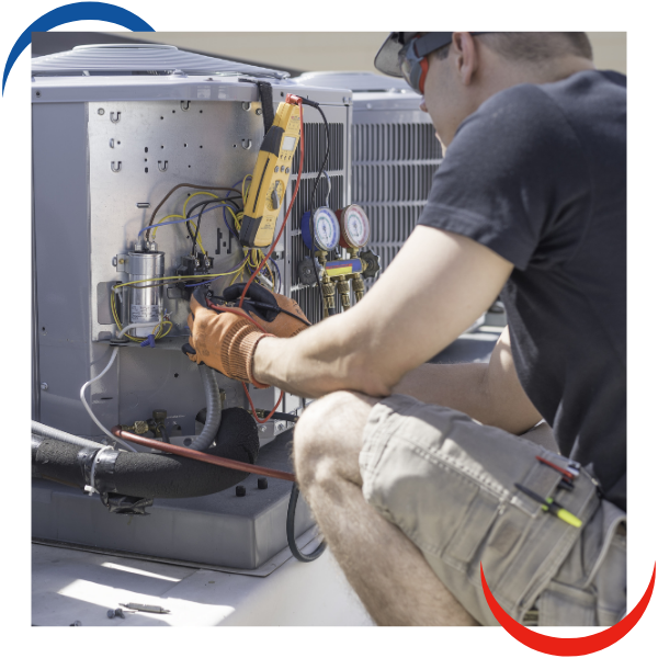 tech working on hvac system tech working on hvac system