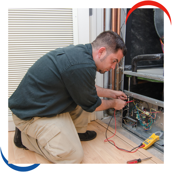 tech working on hvac system