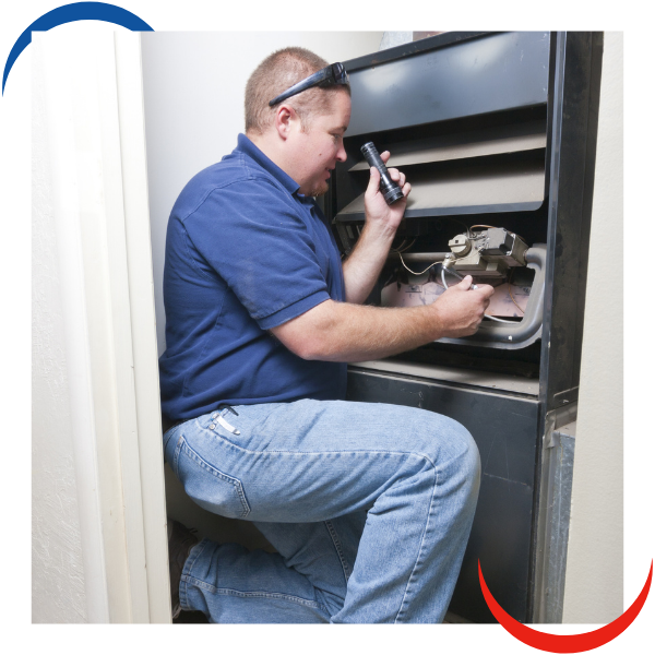 tech working on hvac system