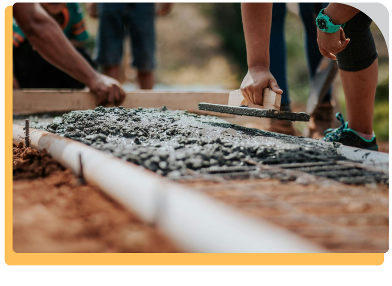 workers laying concrete