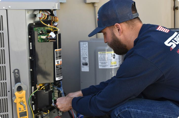 Image of a residential HVAC technician