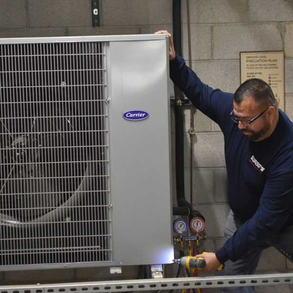 a man installing a commercial AC unit Rancho Mirage (4).jpg
