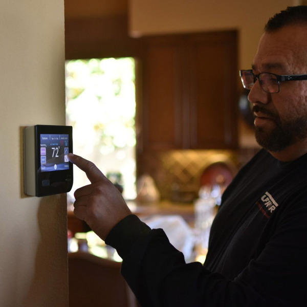 a man testing a thermostat Rancho Mirage (3).jpg