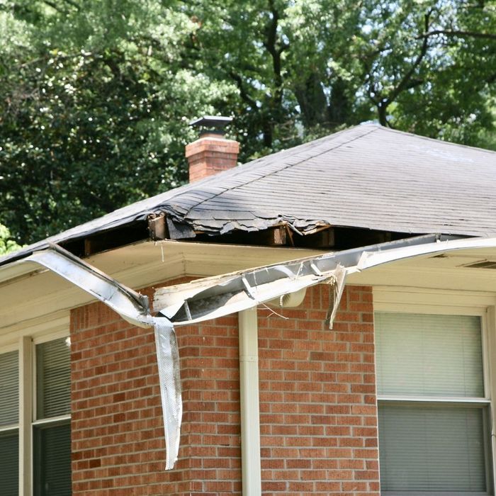heavily damaged gutters after a storm