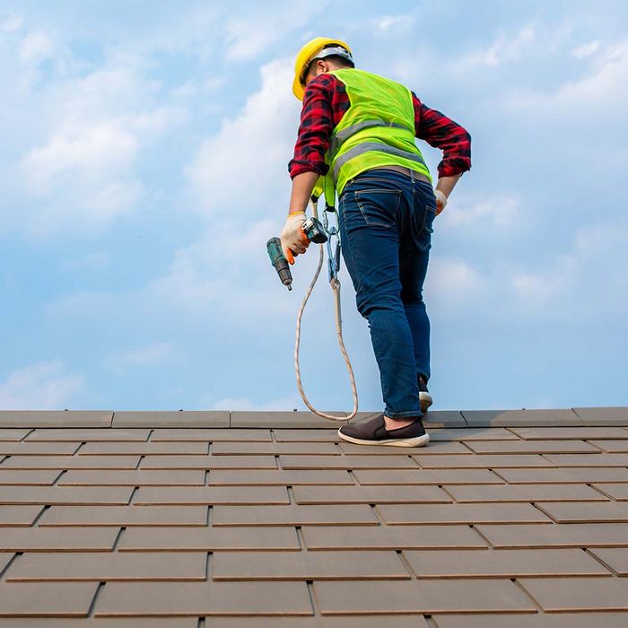 roofer standing on roof