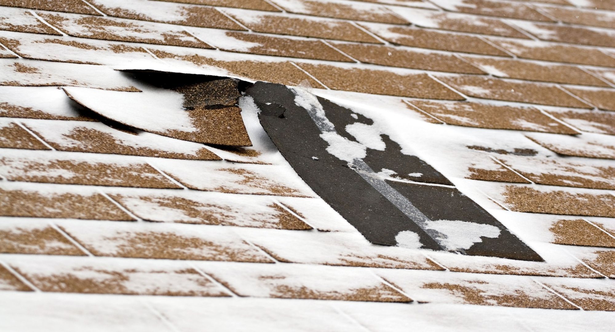 damaged roof from winter weather damaged roof from winter weather