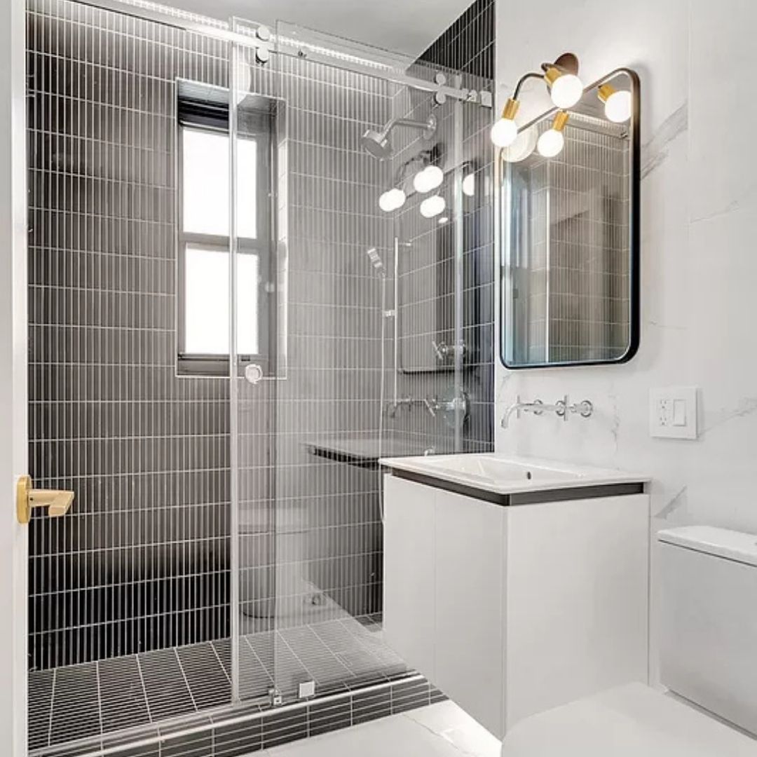 walk-in shower with glass doors