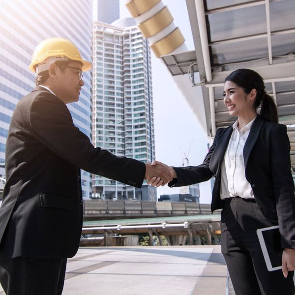 construction managers shaking hands