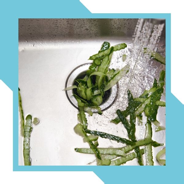 Vegetables going into garbage disposal