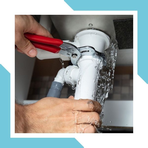 Common household pipe leak being repaired