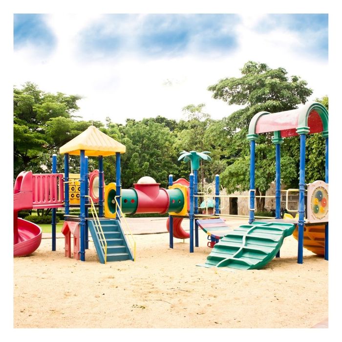 faded playground equipment in the sun