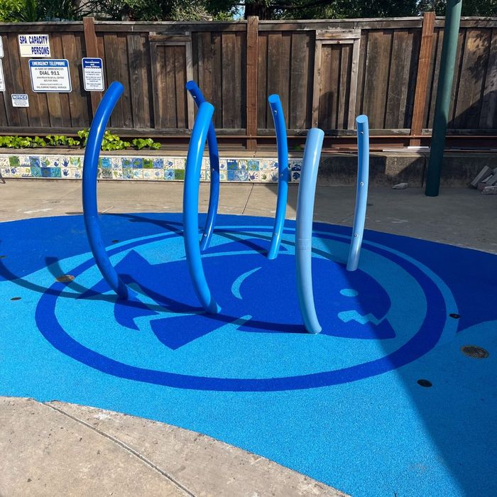 Blue designed rubber surfacing on playground Blue designed rubber surfacing on playground