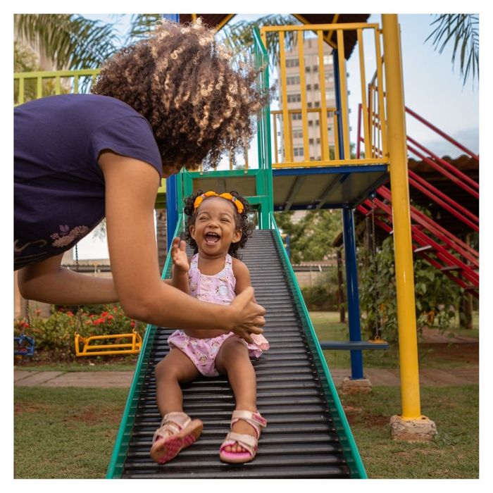 mother with her child at a playground