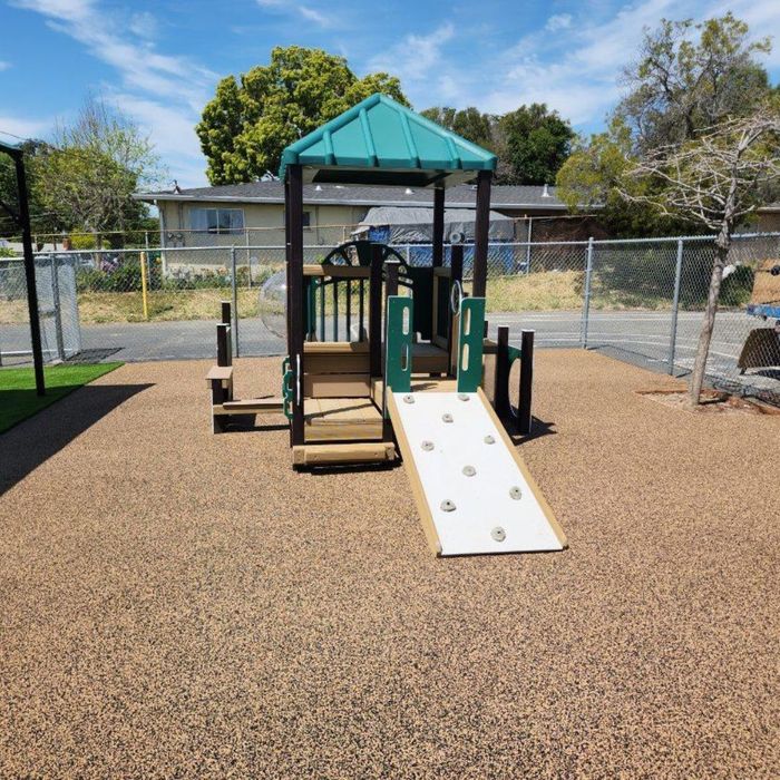 playground with repaired rubber surfacing playground with repaired rubber surfacing