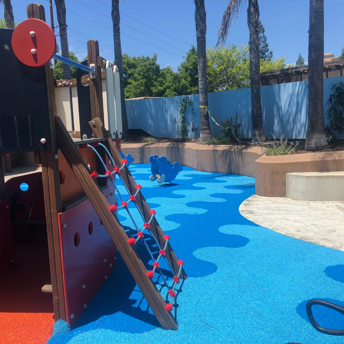 Poured-in-Place (PIP) surfacing that is blue