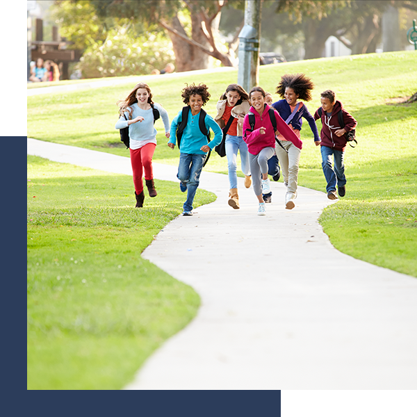 children running excited in a park