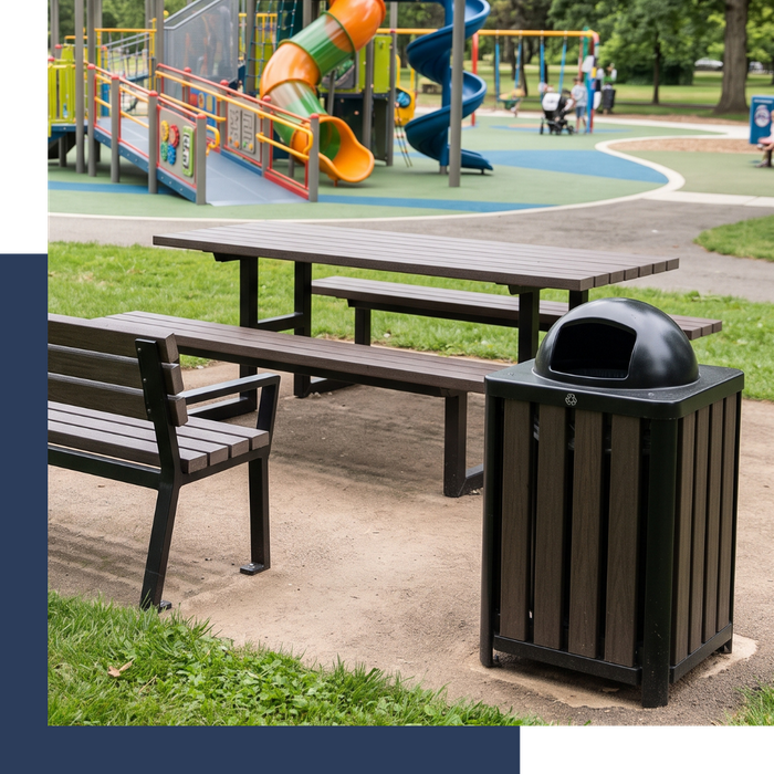 Commercial playground site amenities including a sturdy park bench, picnic table, and trash receptacle.