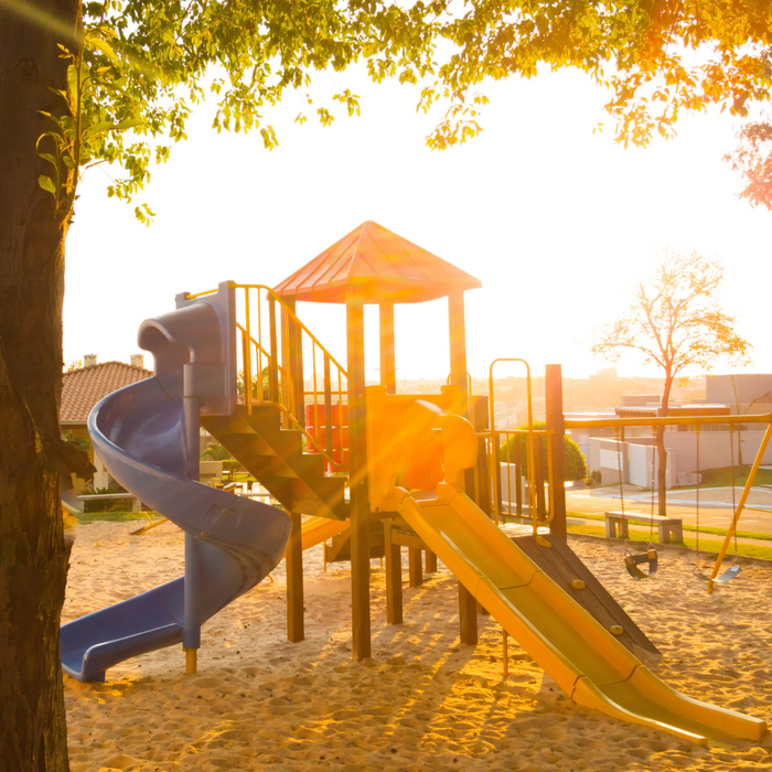 sun shining on a playground. 