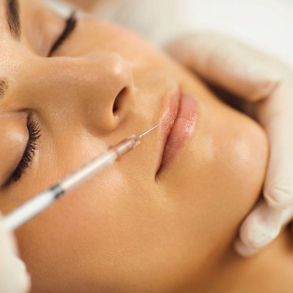 woman getting lip filler