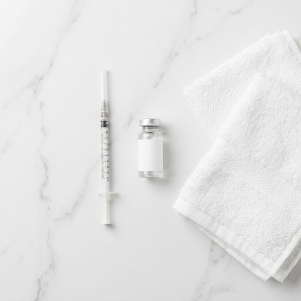 Luxurious med spa setting with skincare tools and soft white towels