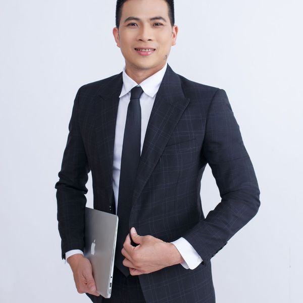 sculpted man in suit