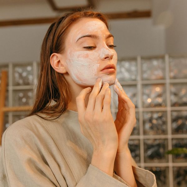 Woman doing skincare.