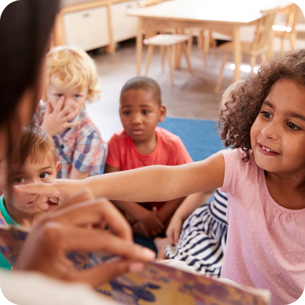 girl pointing in class