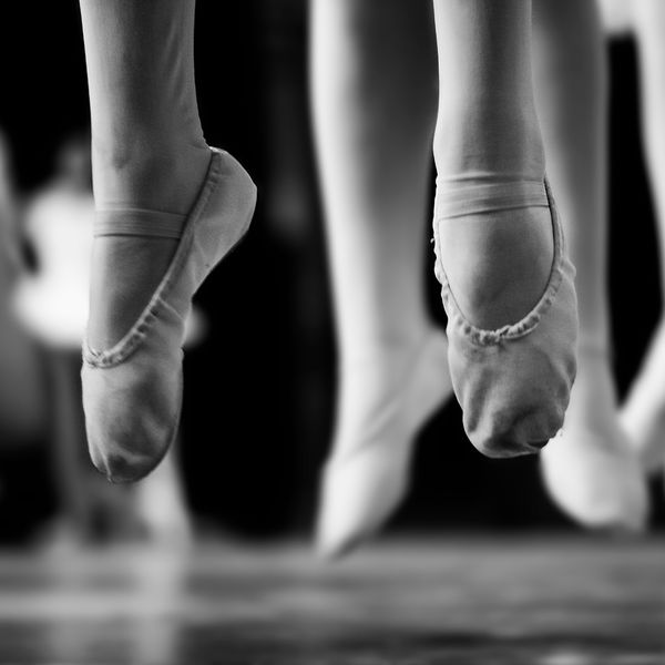 Ballerina feet lifted off the ground