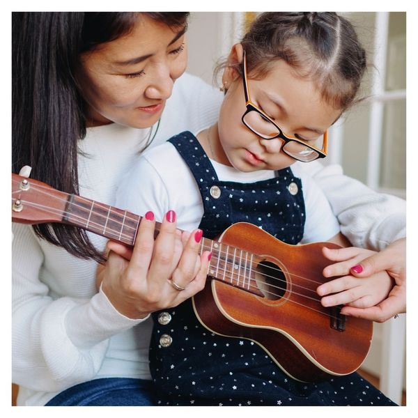 girl playing guitar